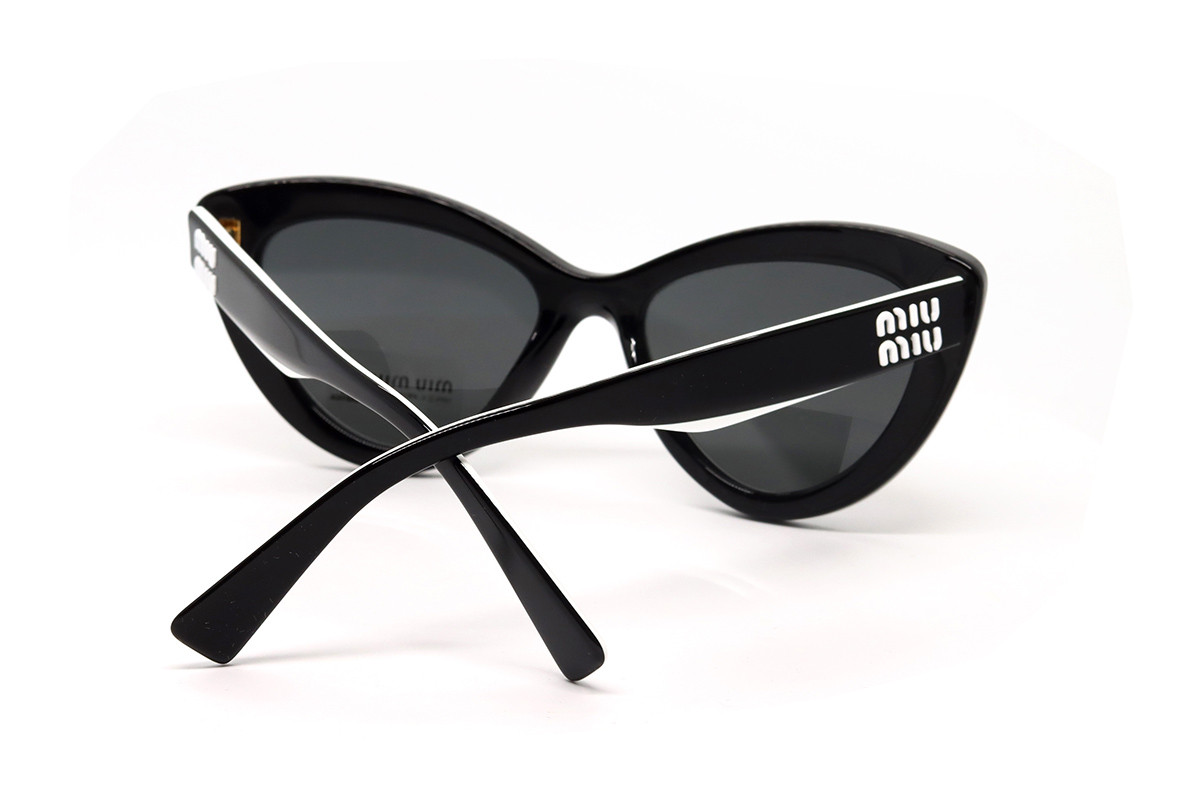 Солнцезащитные очки MU 04YS 10G5S0 54 Фото №4 - linza.com.ua